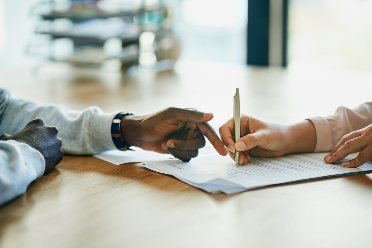 image of diverse editors' hands writing together 